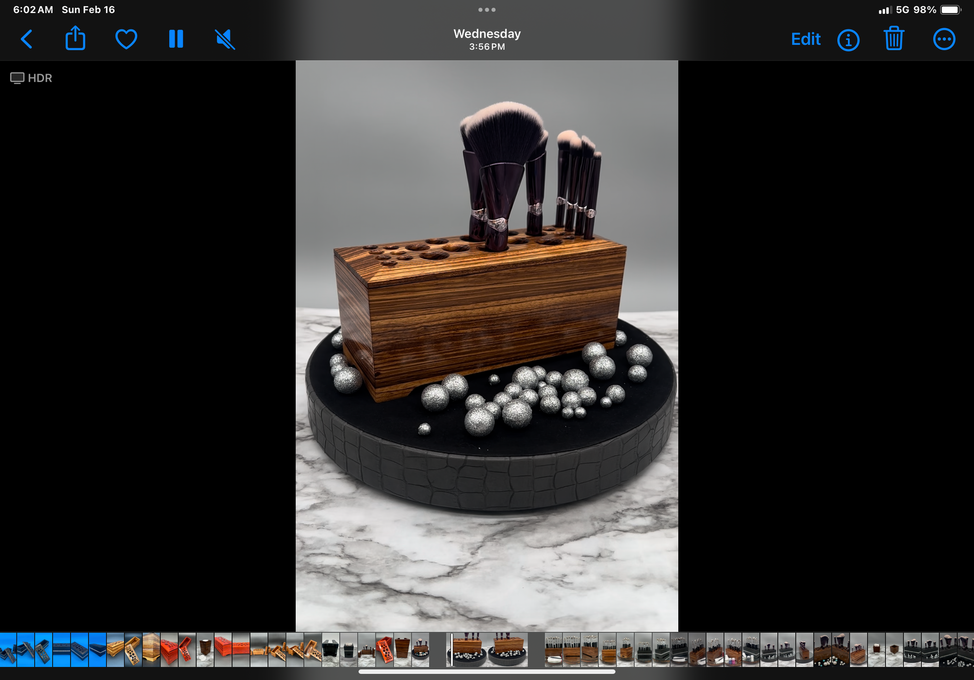 Set of makeup brushes stored upright in a luxt wooden rectangular holder, made of Beautiful Zebrawood